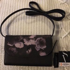 Elegant signature mini , detachable strap.